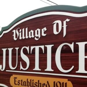 Village of Justice sign